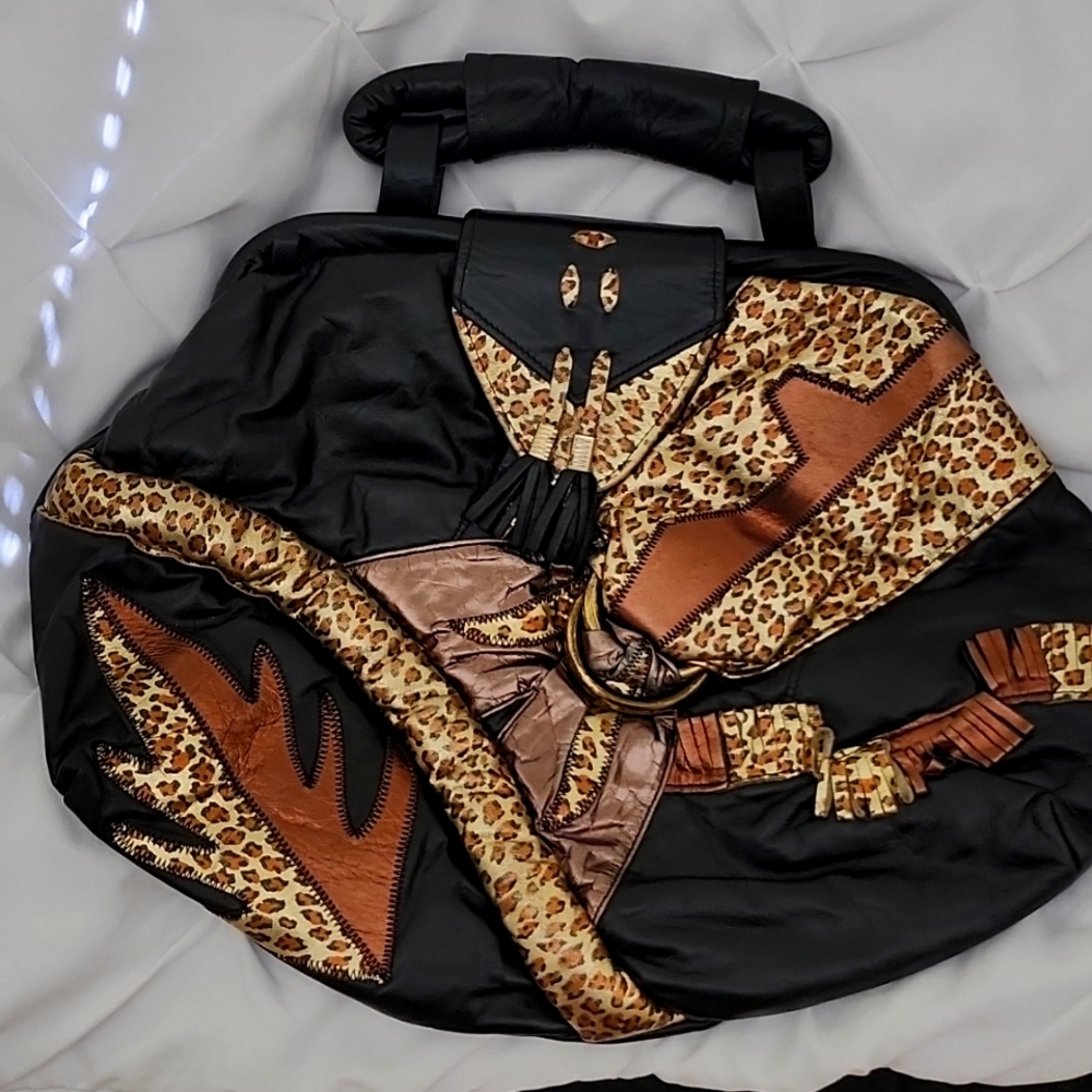 Decorative black and gold handbag